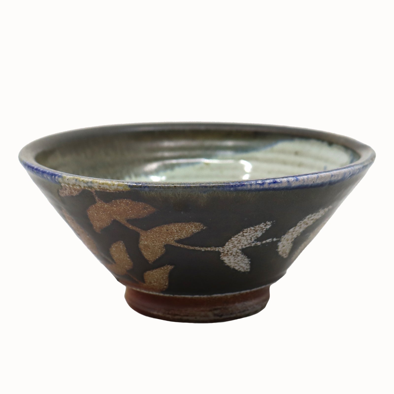 Heather Ossandon handmade, wood-fired ceramics. Cereal bowl, black and blue with rust and cream botanical pattern.