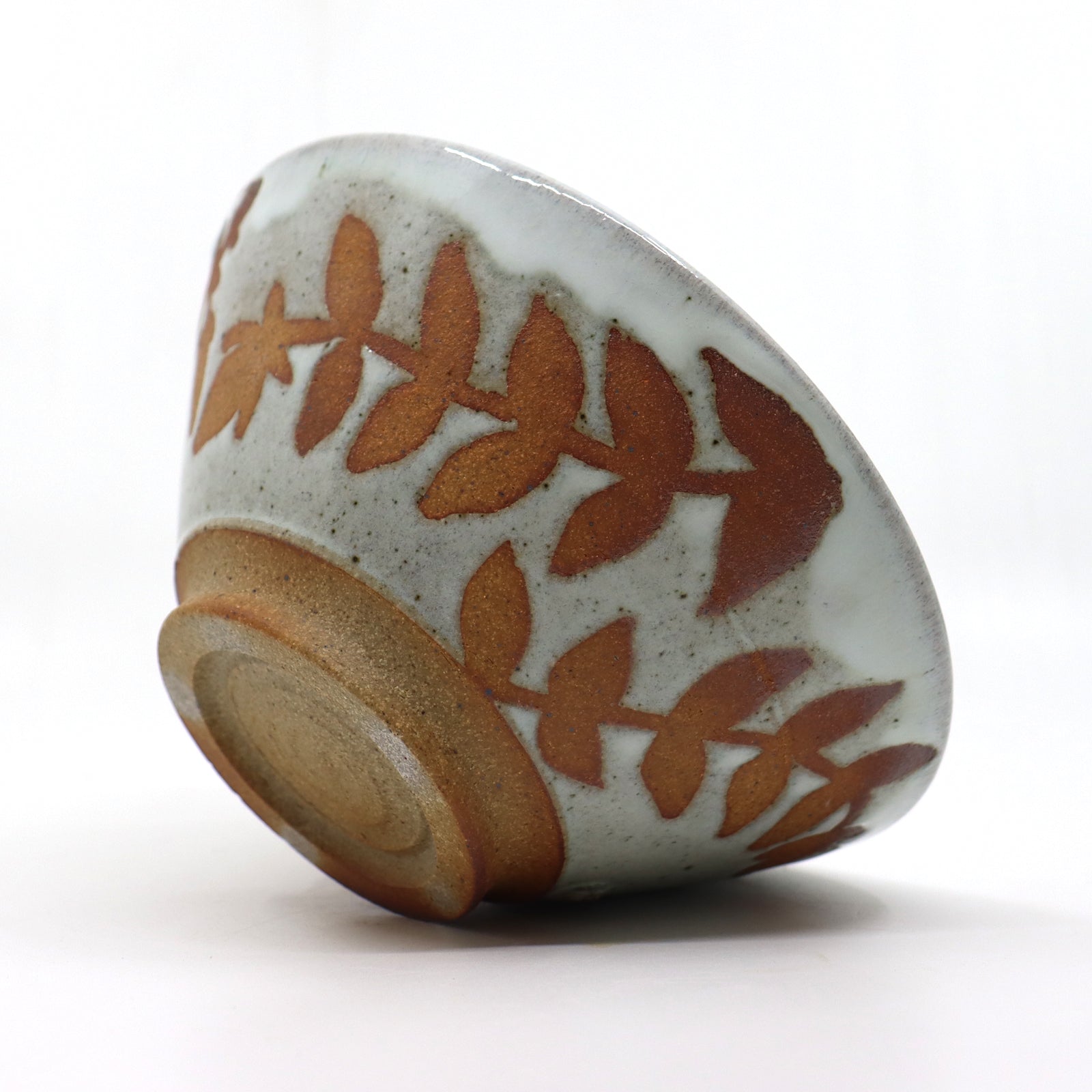 Handmade, wood-fired stoneware bowl with botanical pattern by Heather Ossandon