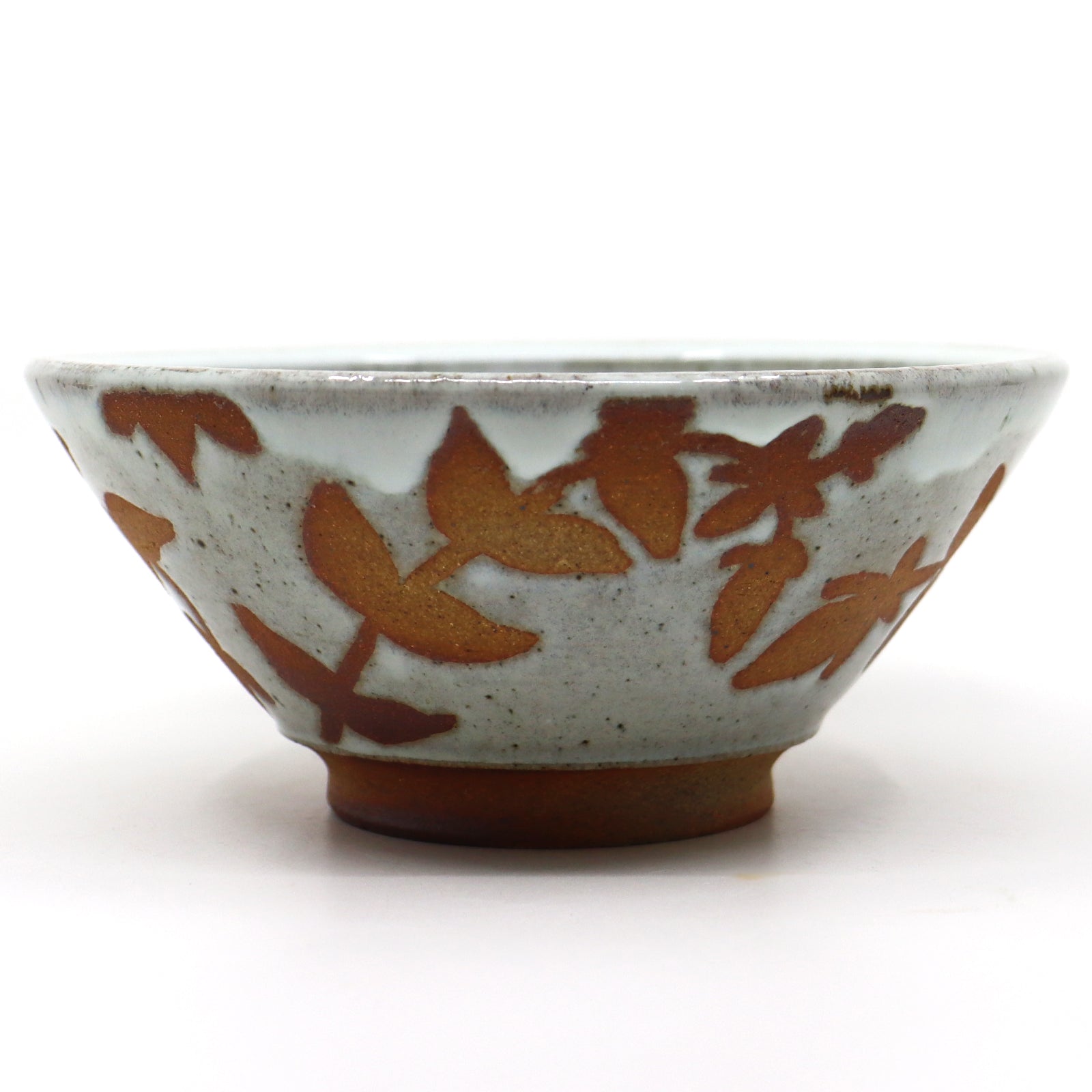 Handmade, wood-fired stoneware bowl with botanical pattern by Heather Ossandon