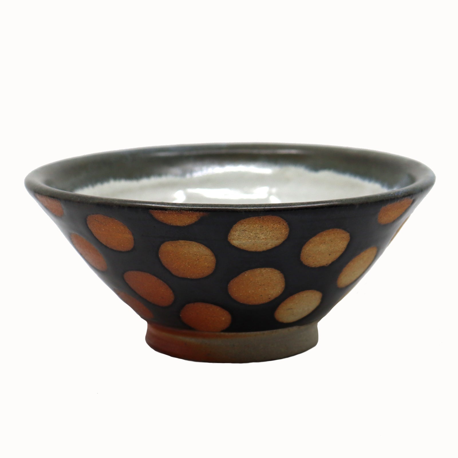 Heather Ossandon handmade, wood-fired cereal bowl. Black with rust polka dots.