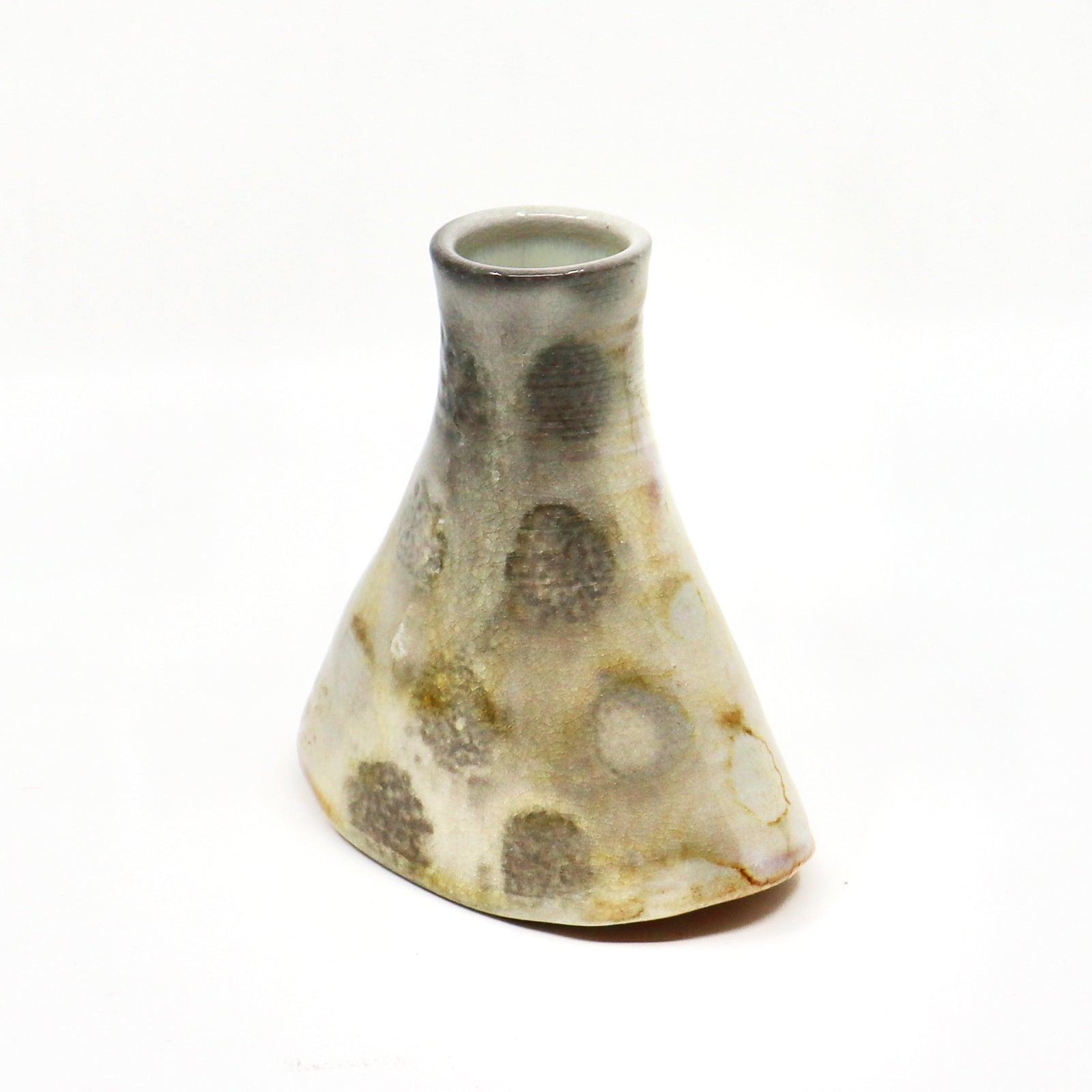 Wood fired ceramic bud vase with polka dots.