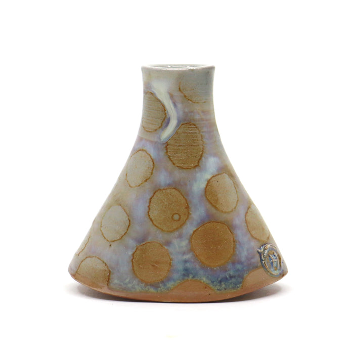 Wood fired ceramic bud vase with polka dots.