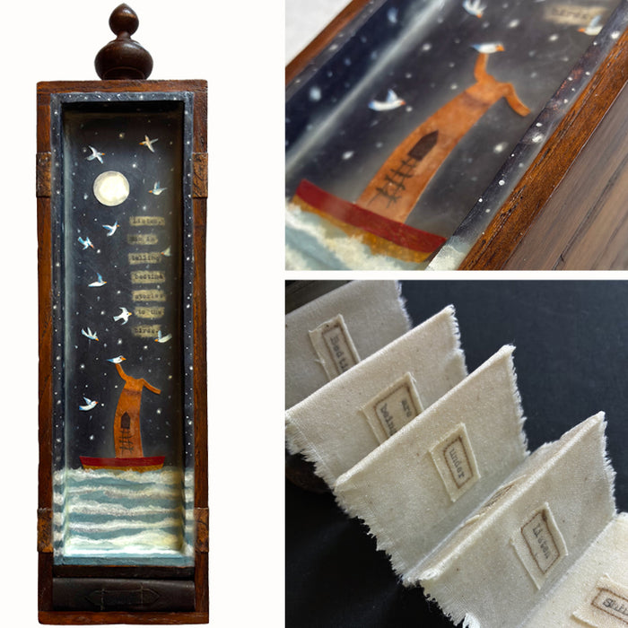 Tall, narrow box with finial on top, mixed media encaustic artwork encased inside, and a small handmade book. Artwork by Janet Eskridge. Interior and book details shown. 
