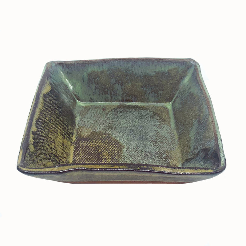 Small, multicolor square bowl by potter Jim Rientjes. Earthy tones and vibrant blues.