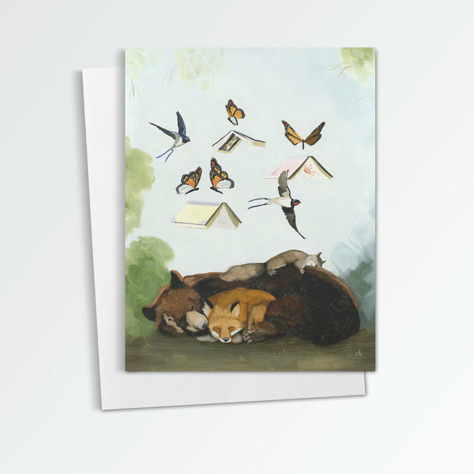 Daydream notecard from Kim Ferreira. A bear, fox and squirrel nap on the ground while birds, butterflies and books float and fly above them.