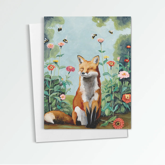 Zinnias notecard from Kim Ferreira. A fox sits among a garden of zinnia flowers, bees buzz overhead.