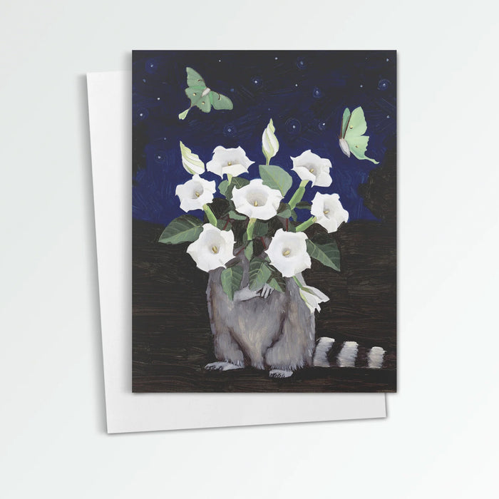 Moonflowers notecard from Kim Ferreira. A raccoon holds moonflowers with luna moths fluttering above.