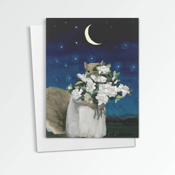 Squirrel with Gardenia notecard from Kim Ferreira. A squirrel hold a bouquet of gardenia flowers under a night sky and crescent moon.