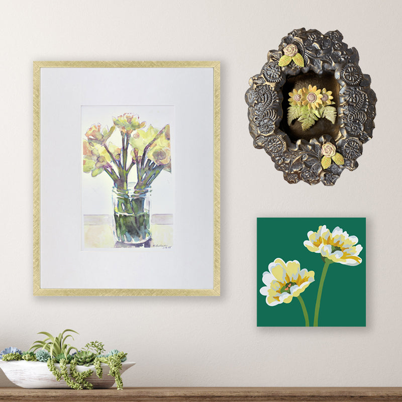 Three pieces of artwork featuring yellow flowers from artists Marianne Huebner, Paula Smith and Michele Aschenbrenner.