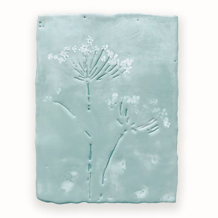 Mixed media encaustic painting by Liberty Hanson Wild in soft blue greens and white with embossed botanical detail. 