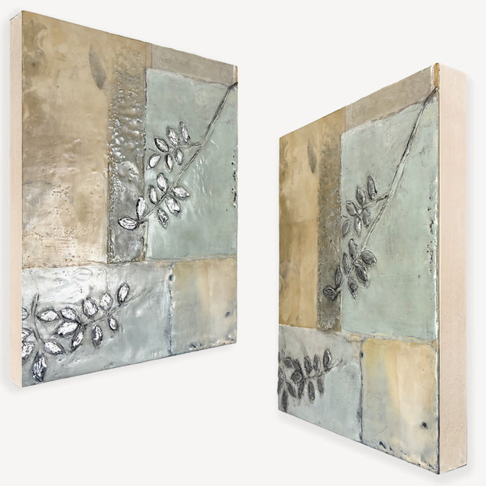 Mixed media encaustic artwork from Liberty Hanson-Wild's series called Yesterday's Seeds.  An abstracted background in neutral colors with textures and leaf pattern with silver. Painting shown from both angles. 