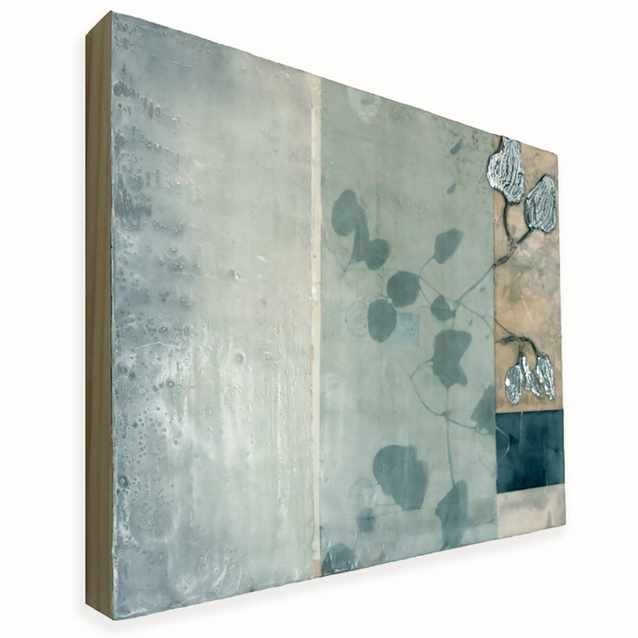 Mixed media encaustic artwork from Liberty Hanson-Wild's series called Yesterday's Seeds.  An abstracted background in neutral colors, textures and leaf pattern with silver. Side view. 