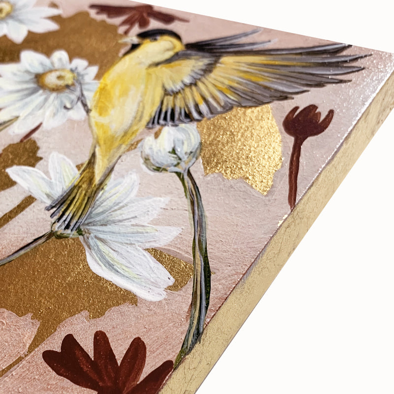 "Garden Friends 1" painting by artist Lynne Miller. The 8 x 8" acrylic and gold leaf painting features a goldfinch, white daisies and a bee, with gold leaf details. Gold leaf side detail.