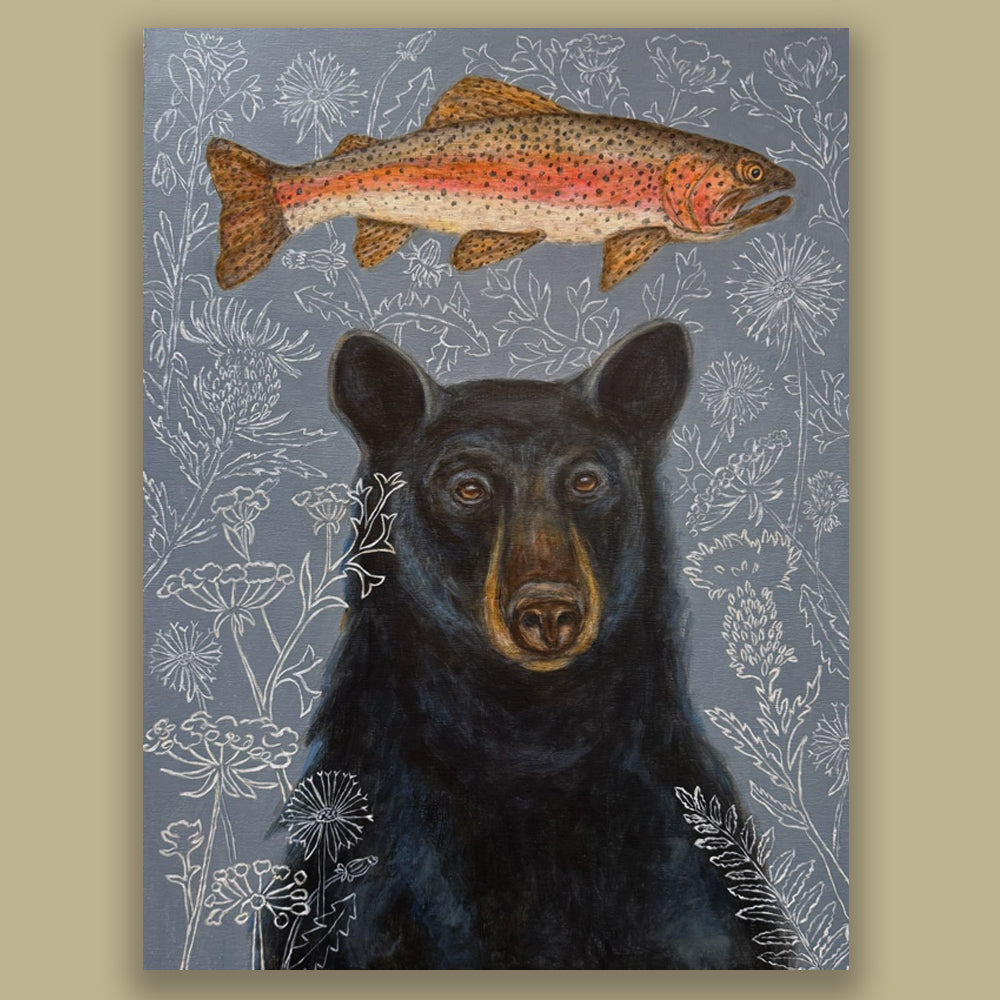 "Bear's Dream" by artist Martha Worthy. Acrylic painting of a black bear with a fish above its head. The gray background is filled with outlines of floral  and botanical details. Shown on a tan wall.