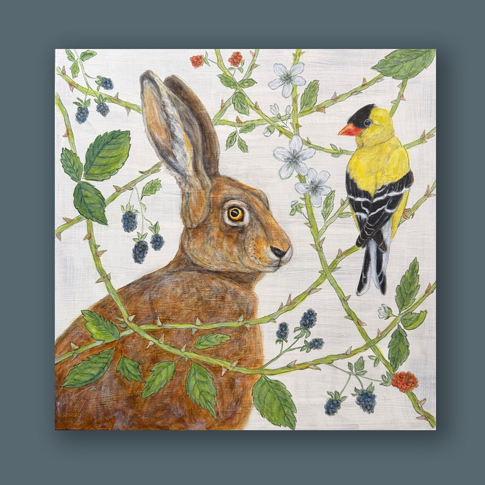 "The Briar Patch" artwork by Martha Worthy. The nature inspired acrylic painting features a rabbit and a goldfinch in a briar patch. Painting shown on blue wall.