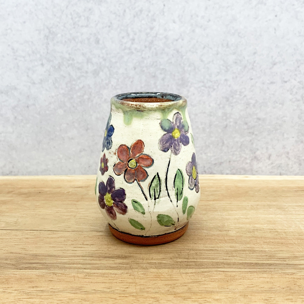 Handmade ceramic bud vase with flower decoration by Molly Lithgo. Made in NC.