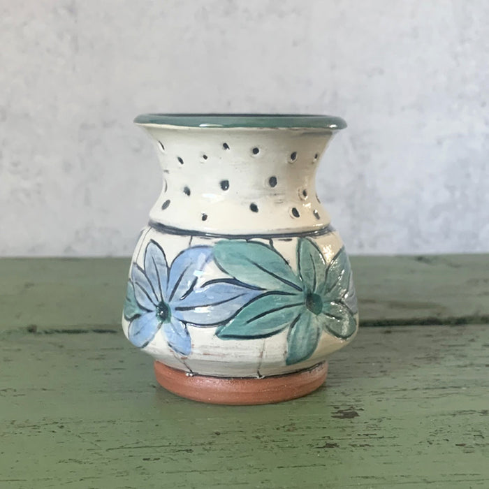 Mini handmade bud vase with aqua and purple flowers by Molly Lithgo. Made in NC.