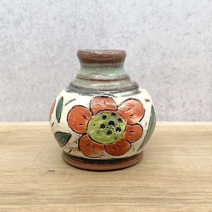 Handmade ceramic bud vase with flower decoration by Molly Lithgo. Made in NC.