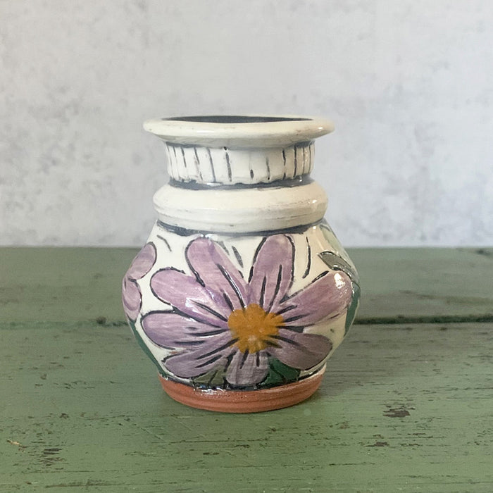 Mini handmade bud vase with purple flowers by Molly Lithgo. Made in NC.