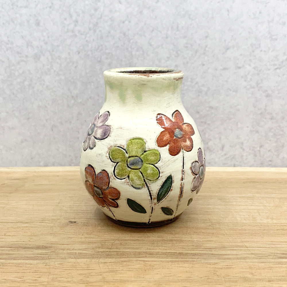 Handmade ceramic bud vase with flower decoration by Molly Lithgo. Made in NC.