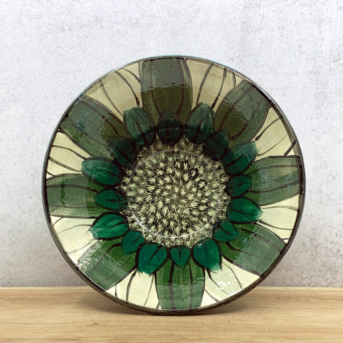 Handmade ceramic bowl with interior flower decoration by Molly Lithgo. Made in North Carolina. 