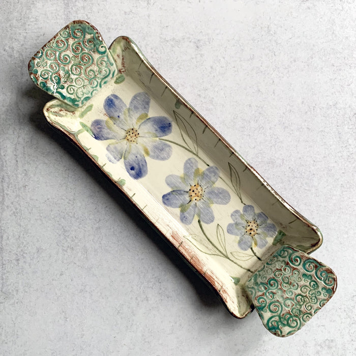 Handmade ceramic tray by Molly Lithgo, decorated with blue flowers. Made in North Carolina.