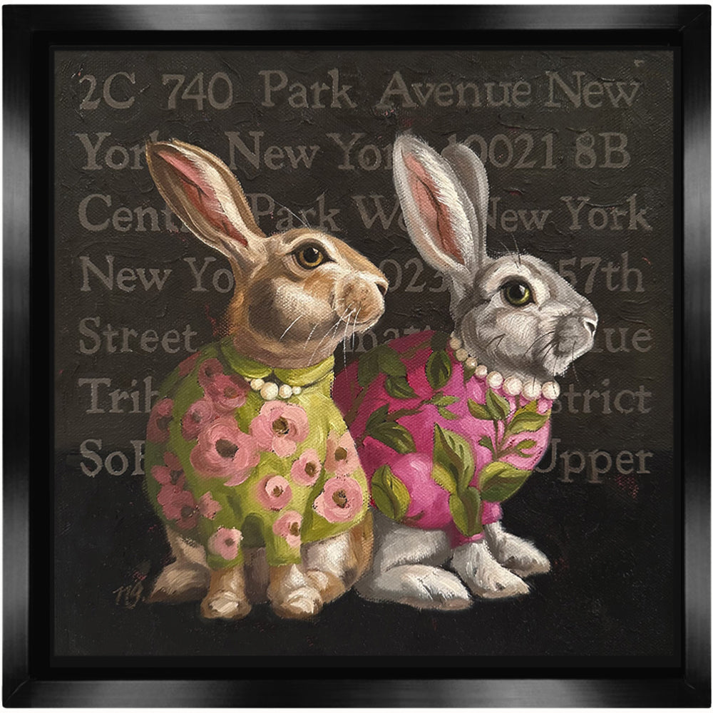 "Excelsior" rabbit and New York themed painting by Ninalee Irani at Lark & Key art gallery. Two post rabbits, dressed in colorful florals and pearls sitting in front of a backdrop filled with streets and landmarks of New York City.