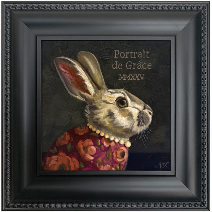 Portrait of Grace rabbit painting by Ninalee Irani. Portrait of a rabbit wearing a floral shirt and pearls, set in a black frame.