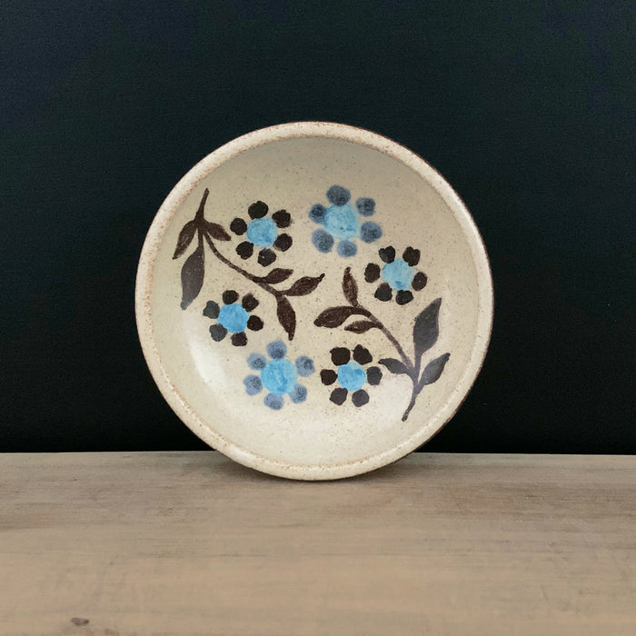 Handmade pottery from Off Menu Pots. Small round catchall dish with blue flowers, handmade.