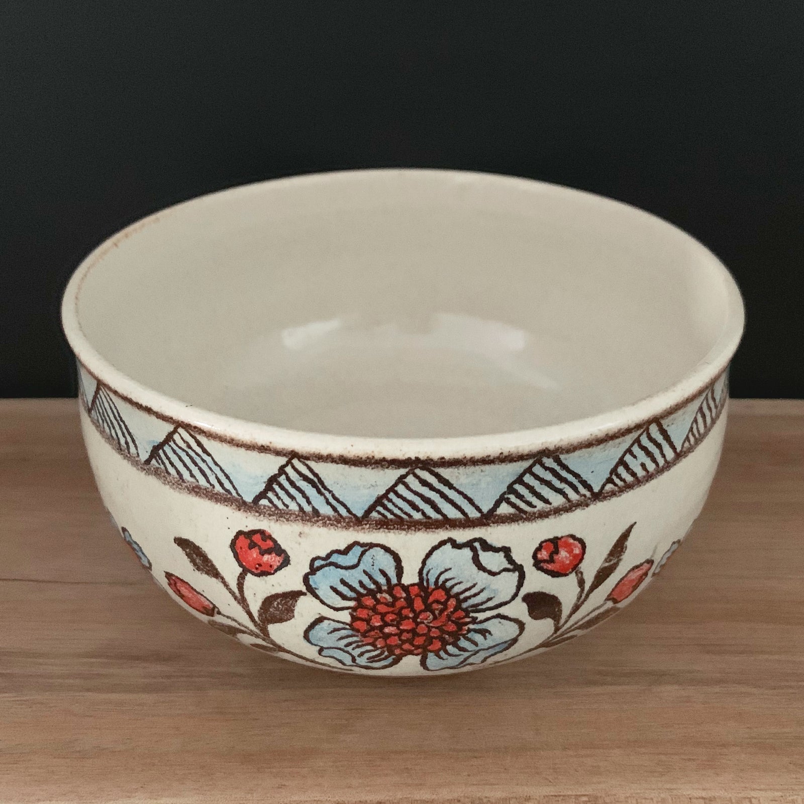 Handmade pottery from Off Menu Pots. Vintage inspired bowl with blue and red flowers. Available at larkandkey.com.