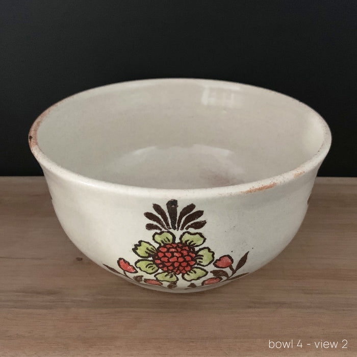 Handmade pottery from Off Menu Pots. Vintage inspired bowl with red and chartreuse flowers. Available at larkandkey.com.