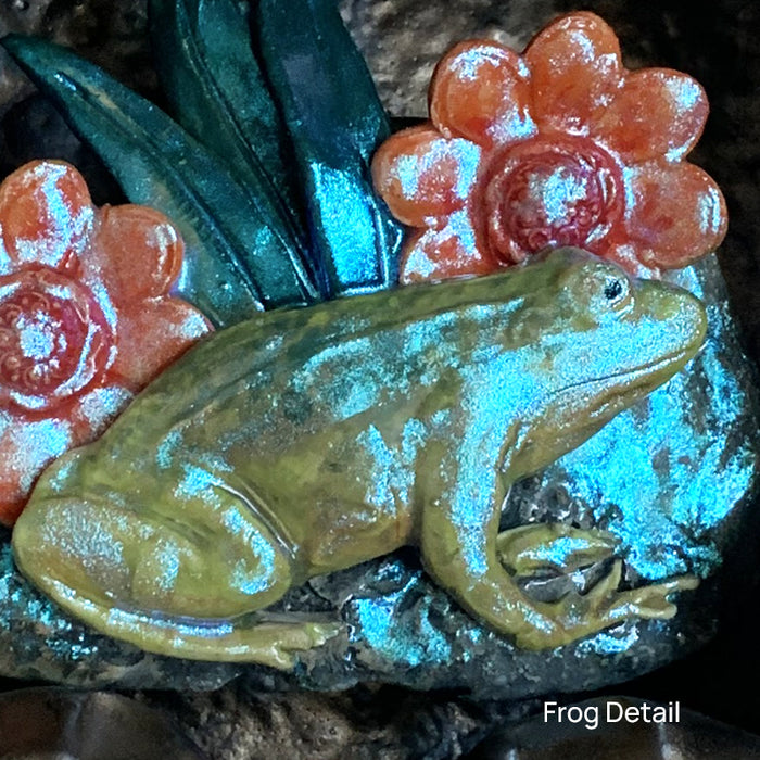 Frog 2 ceramic wall niche by Paula Smith. Decorative wall art featuring a frog and flowers. Frog detail.