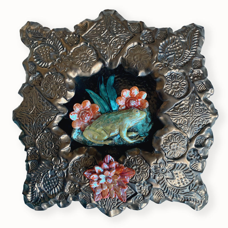 Frog 2 ceramic wall niche by Paula Smith. Decorative wall art featuring a frog and flowers. 