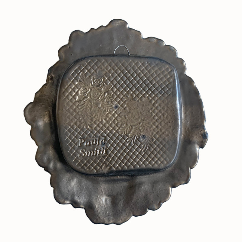 Hummingbird ceramic wall niche by Paula Smith. Decorative wall art featuring a hummingbird and flowers. Back view.