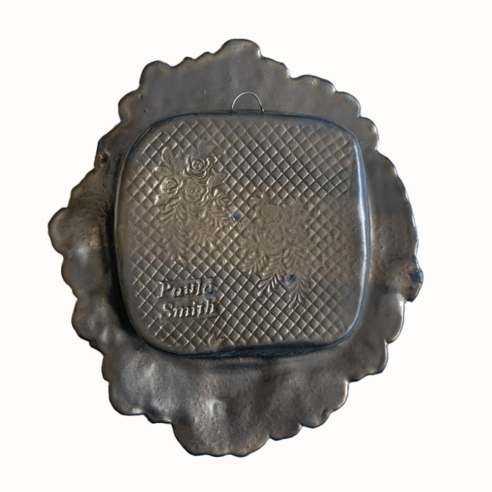 Hummingbird ceramic wall niche by Paula Smith. Decorative wall art featuring a hummingbird and flowers. Back view.