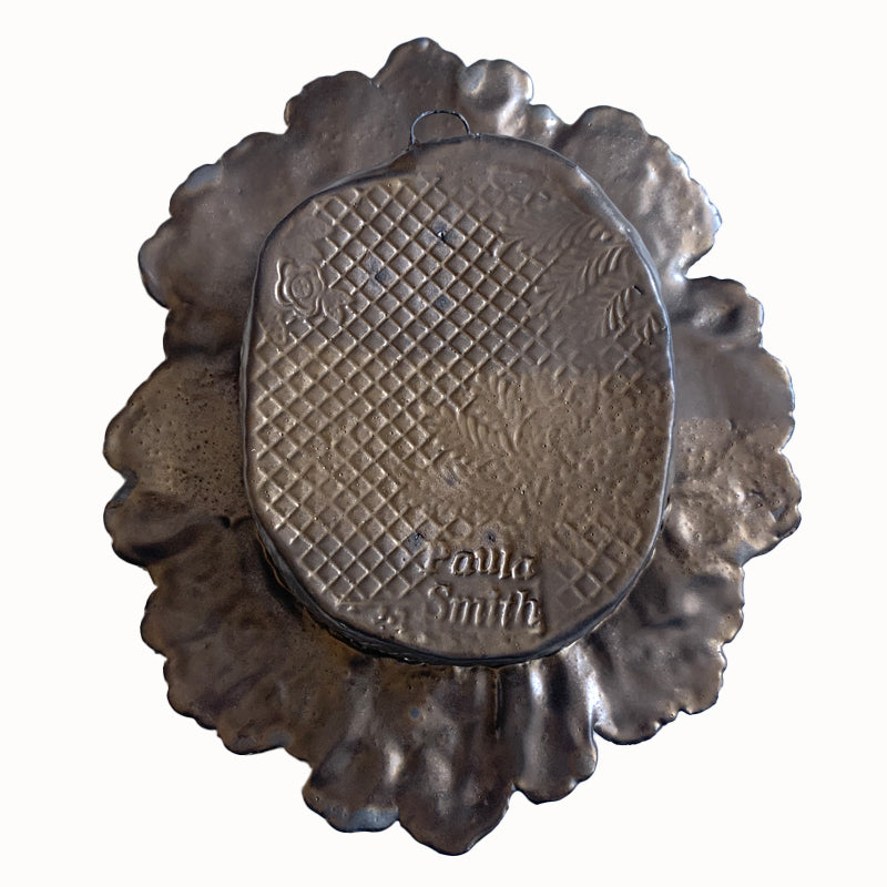 Rabbit and snail ceramic wall niche by Paula Smith. Decorative wall art featuring a rabbit, snail and flowers. Back view.