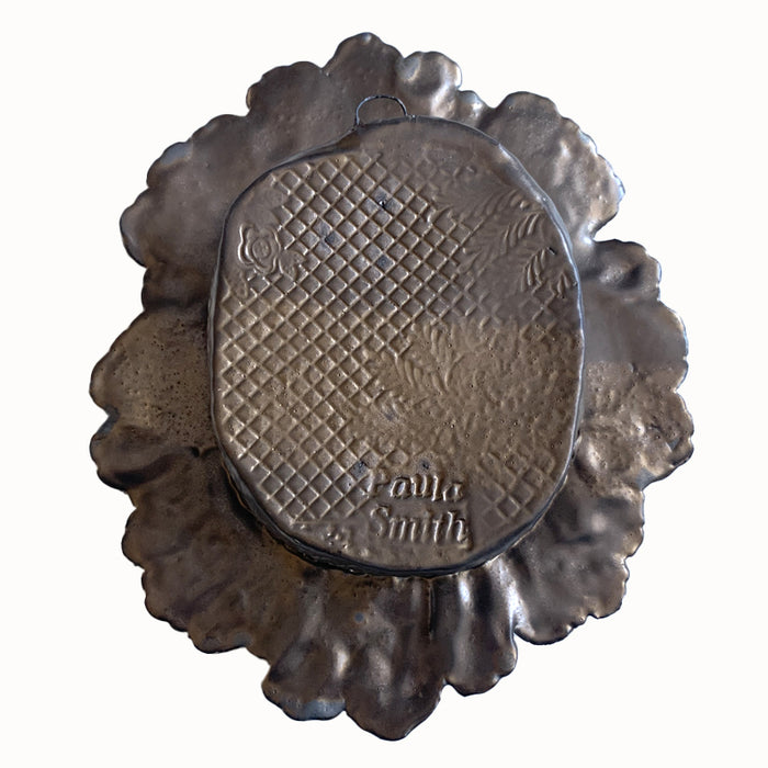 Rabbit and snail ceramic wall niche by Paula Smith. Decorative wall art featuring a rabbit, snail and flowers. Back view.