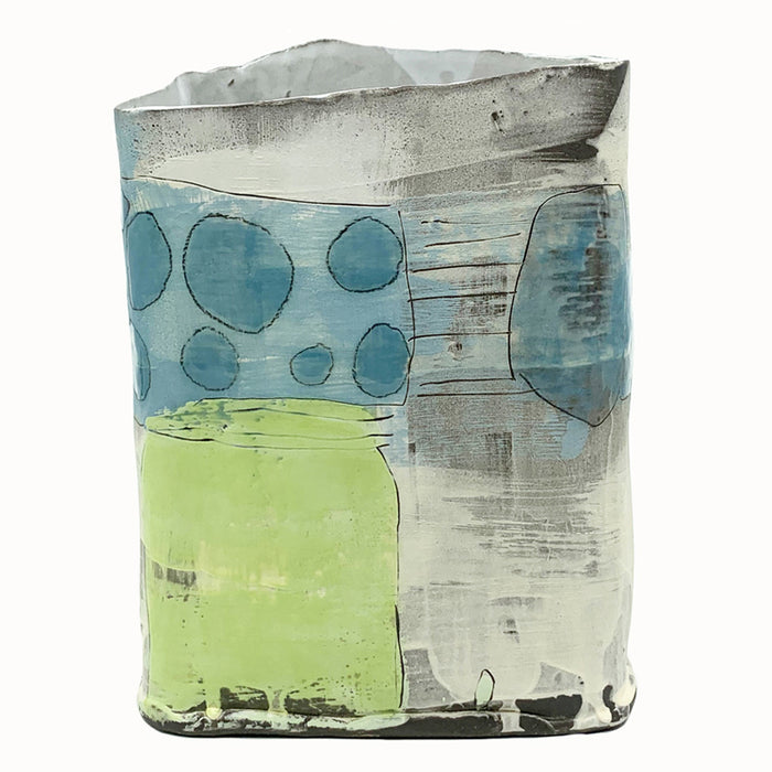 Box vase by ceramic artist Robin Ralston Frelier. Large box vase with graphic blue and green details and various textures. Back view.