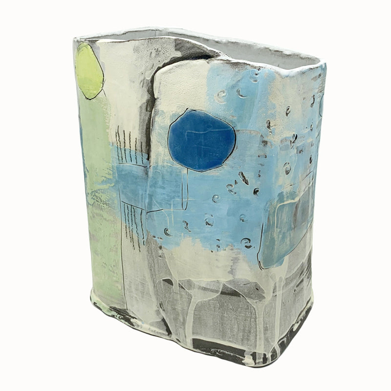 Box vase by ceramic artist Robin Ralston Frelier. Large box vase with graphic blue and green details and various textures. Angled view with blue dot.