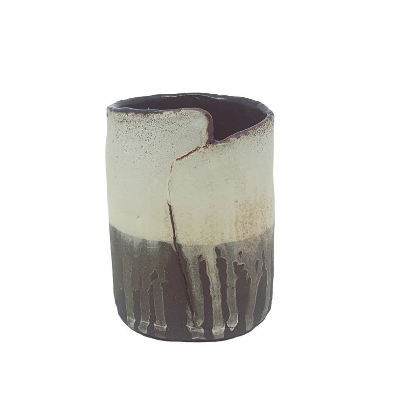 Small dark brown and white drippy vase by ceramic artist Robin Ralston Frelier.