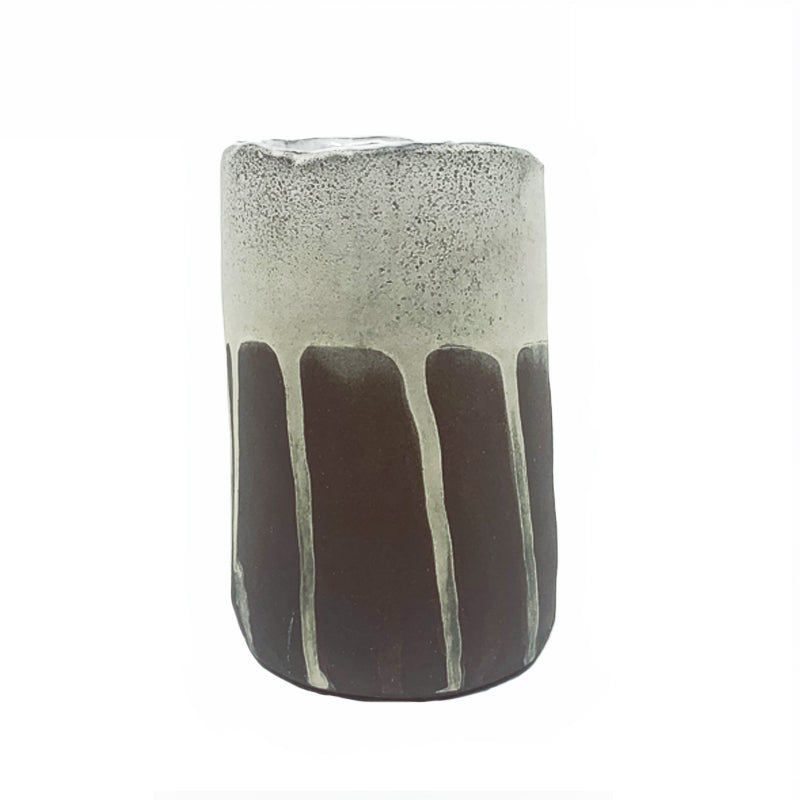 Small dark brown and white drippy vase by ceramic artist Robin Ralston Frelier. Back view.