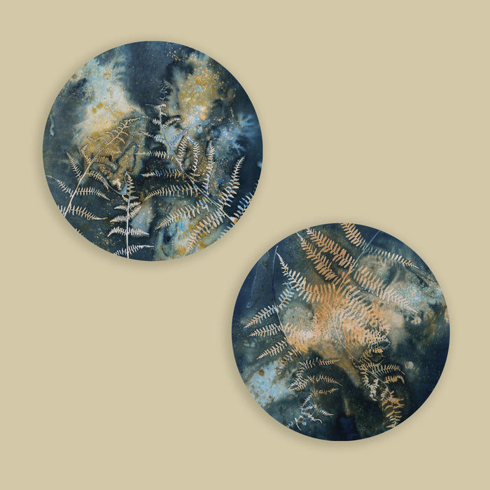 Two fern and night sky inspired eco-printed cyanotypes by artist Sarah Treanor. Available at larkandkey.com, Charlotte NC.