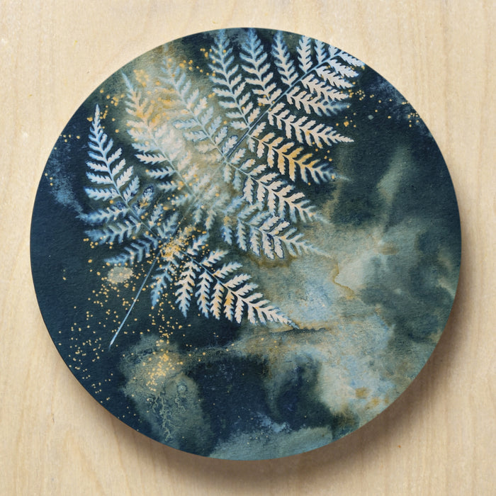 "Astral Dreams" 6" round fern and night sky 'stardust' inspired eco-printed cyanotype artwork by Sarah Treanor. Available at larkandkey.com, Charlotte NC.