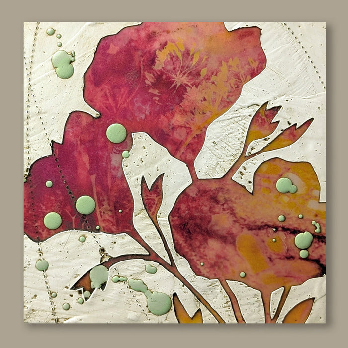 Bloom No. 11, small mixed media painting by artist Sarah Treanor. Fuchsia and orange textural, floral artwork created with digital prints of the  artist's cyanotypes and eco prints underneath layers of encaustic paint, with splatters of light green encaustic on top. Shown on tan wall.