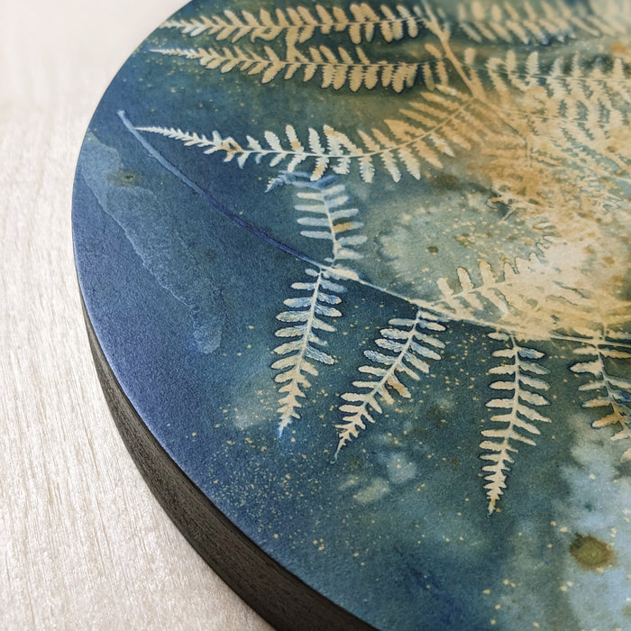 Detail of "Cosmic Woodland", fern and nigh sky inspired eco-printed cyanotype artwork by Sarah Treanor.