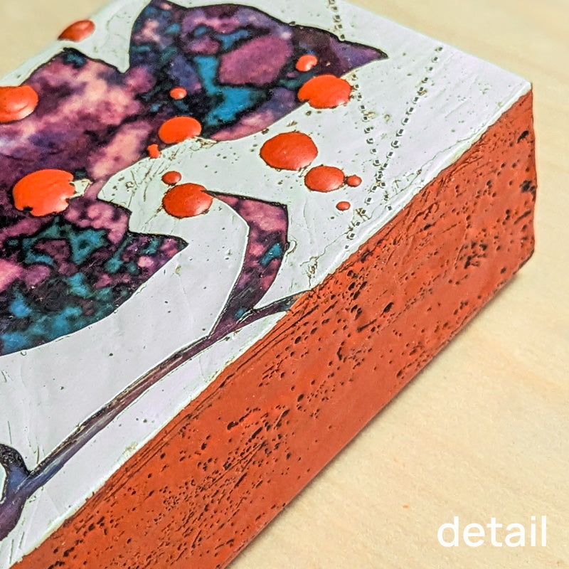 Luna Poppied mixed media flower painting by Sarah Treanor, with purple, blue and orange details. Side detail shown.