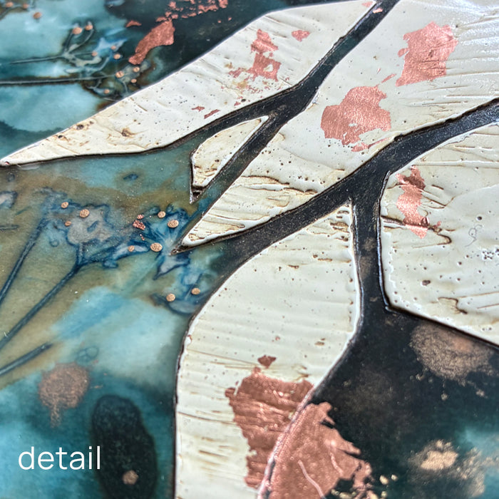 Midnight Embers II mixed media encaustic leaf artwork in rich blues with gold and copper leaf details. Close up view. 