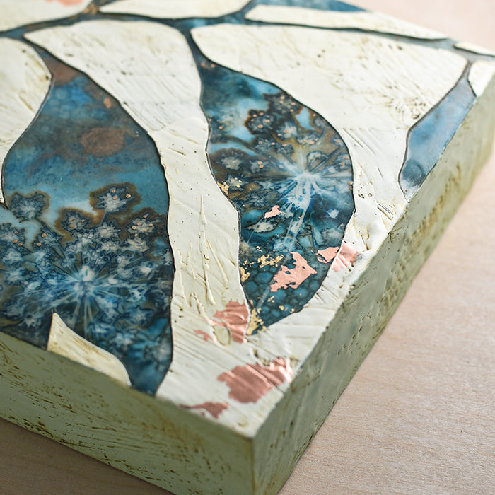 Midnight Embers IV mixed media and encaustic leaf painting with copper and gold leaf details. Side view. 