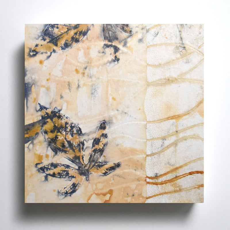 "Summer Blues" 8 x 8" eco-printed purple potato vine leaf artwork by artist Sarah Treanor.  Shown on wall.