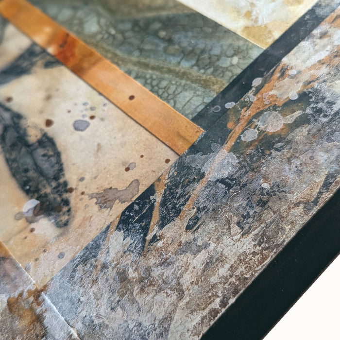 "Veil of the Underwood" mixed media, abstracted wall art by Sarah Treanor. 12 x 6" nature inspired cyanotype, eco-print and acrylic artwork in earthy blues, yellow golds, grays  and creams. Detail shown.